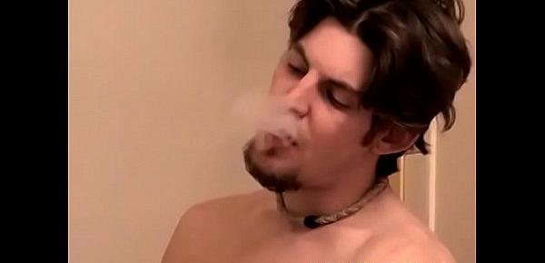  Perverted young man plays with his tool while smoking a cig